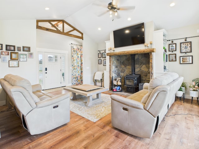 515 School St, Albion, ID 83311 - living room with a wood stove, a ceiling fan, light wood-type flooring, vaulted ceiling, and recessed lighting