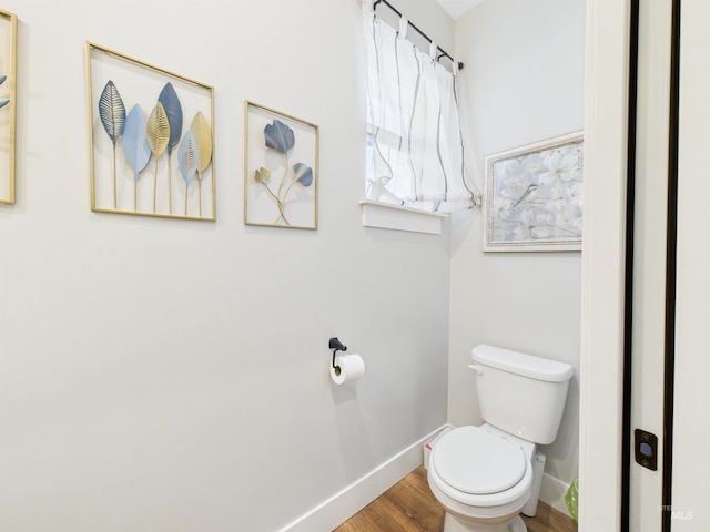 515 School St, Albion, ID 83311 - bathroom featuring baseboards and wood finished floors