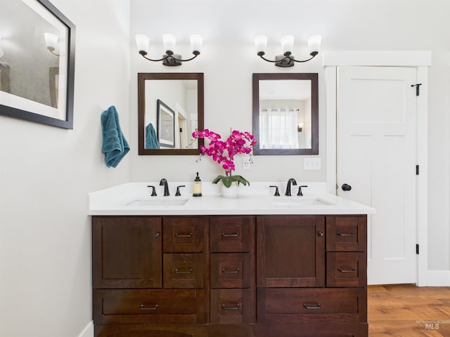 515 School St, Albion, ID 83311 - full bath with double vanity and wood finished floors