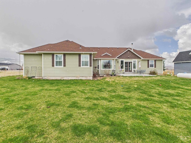 515 School St, Albion, ID 83311 - back of house featuring a patio area and a lawn