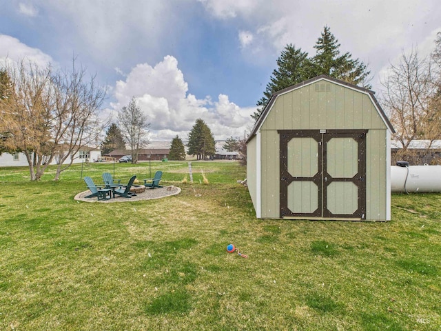 515 School St, Albion, ID 83311 - view of grassy yard featuring a storage shed and an outdoor fire pit