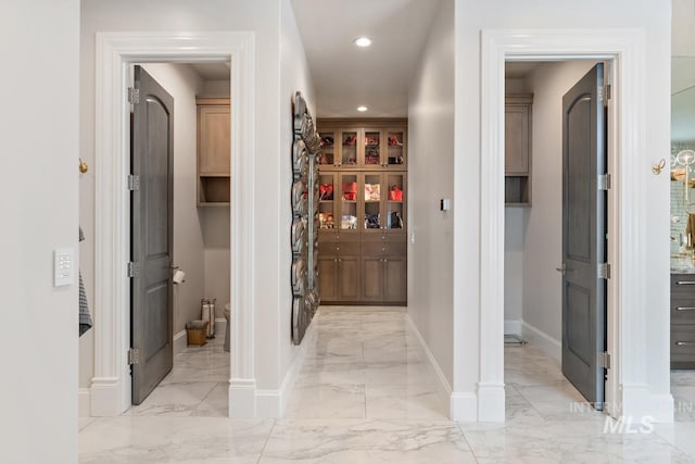 hallway with light tile floors