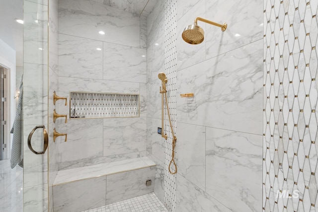 bathroom featuring an enclosed shower