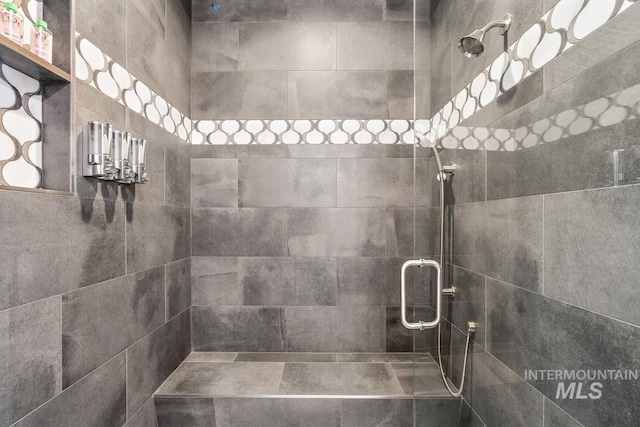 bathroom featuring an enclosed shower