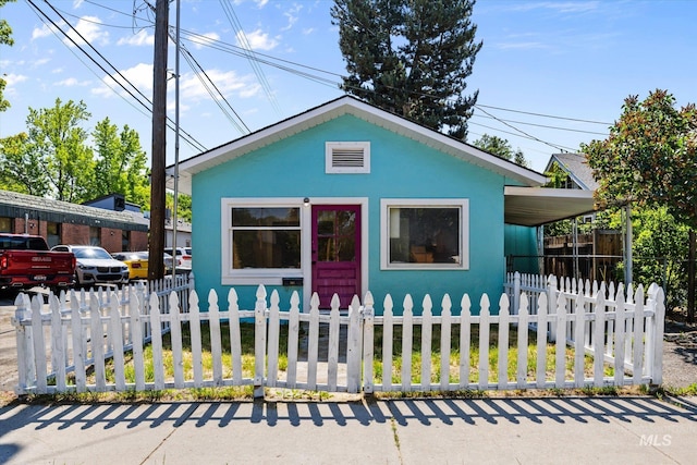 710 N 15th St, Boise, ID 83702 - view of front of property with a fenced front yard and stucco siding