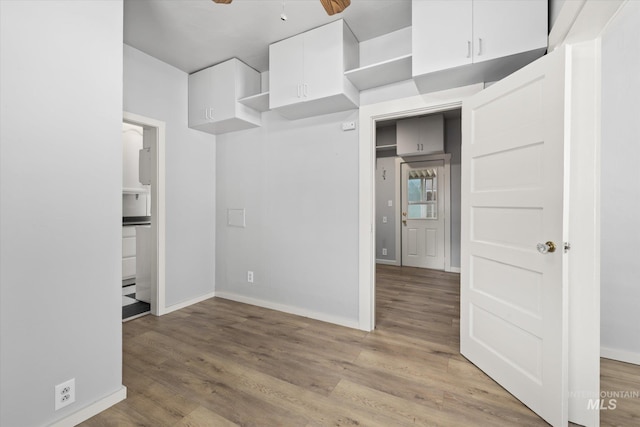 710 N 15th St, Boise, ID 83702 - empty room with light wood-type flooring and a ceiling fan