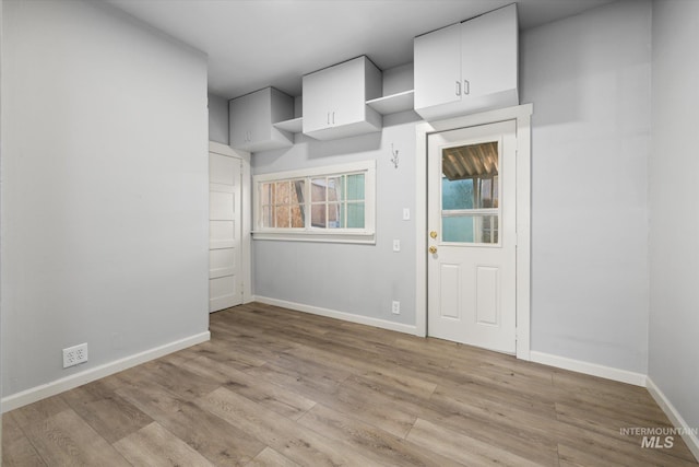 710 N 15th St, Boise, ID 83702 - empty room with light wood-type flooring and baseboards