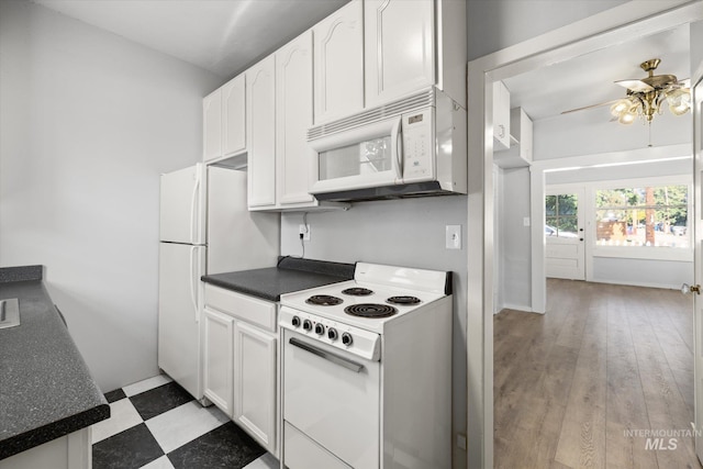 710 N 15th St, Boise, ID 83702 - kitchen with white appliances, a ceiling fan, dark countertops, and white cabinets