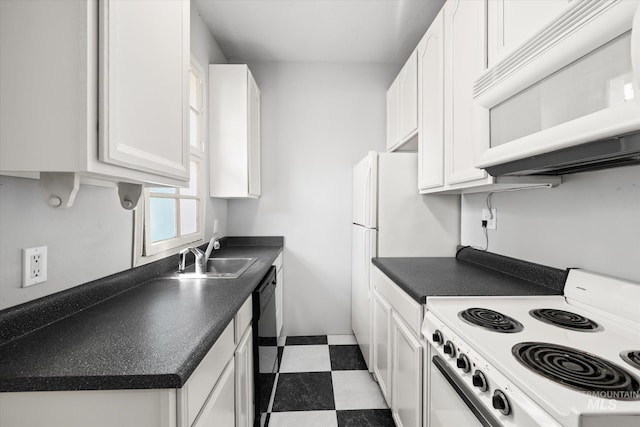 710 N 15th St, Boise, ID 83702 - kitchen with white appliances, tile patterned floors, white cabinetry, and dark countertops