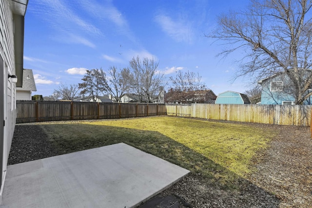 view of yard featuring a patio and a fenced backyard