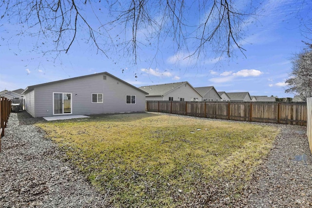 view of yard with a fenced backyard and a patio area