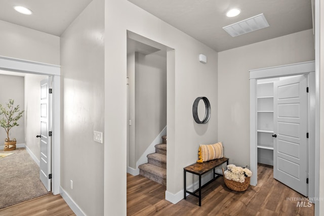 hallway featuring hardwood / wood-style floors