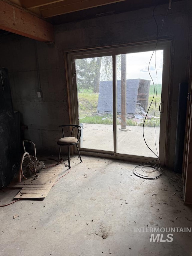 interior space featuring concrete flooring