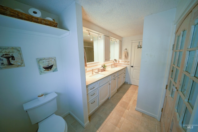 506 Fair Ln, Nampa, ID 83686 - full bath with a textured ceiling, double vanity, toilet, and a sink