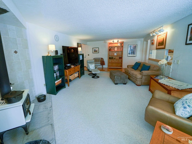 506 Fair Ln, Nampa, ID 83686 - living room with carpet floors and a textured ceiling