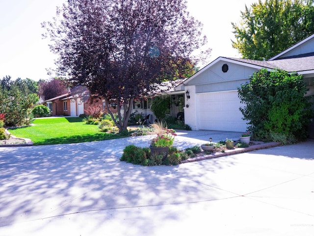 506 Fair Ln, Nampa, ID 83686 - view of front of home with concrete driveway, a garage, and a front lawn