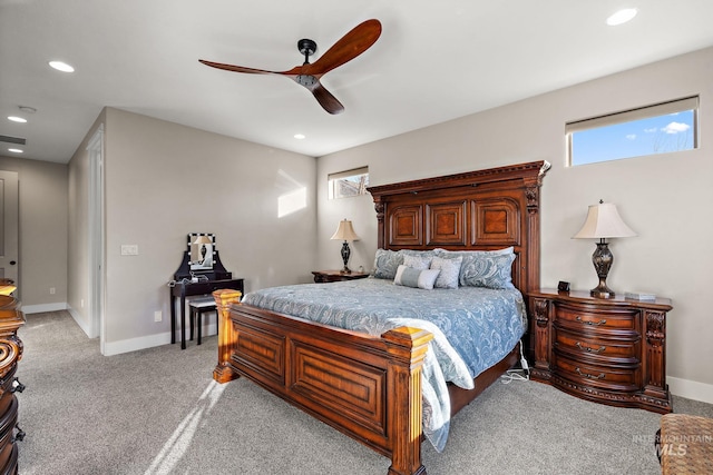 bedroom featuring ceiling fan and light colored carpet