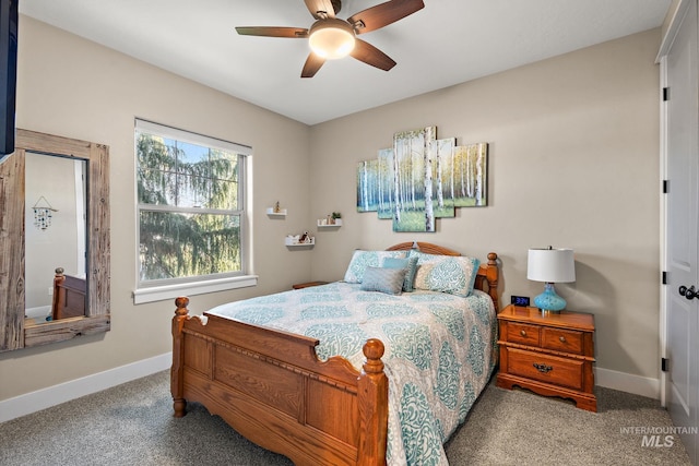 bedroom with ceiling fan and carpet