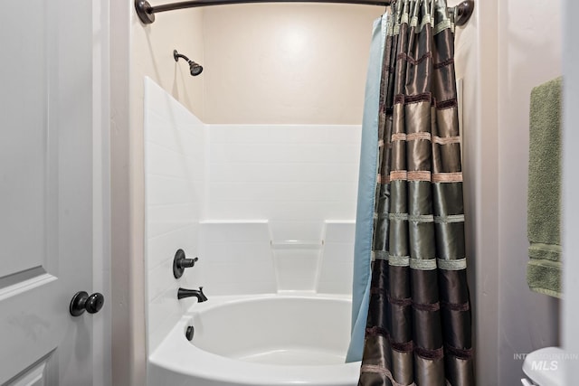 bathroom featuring shower / tub combo with curtain