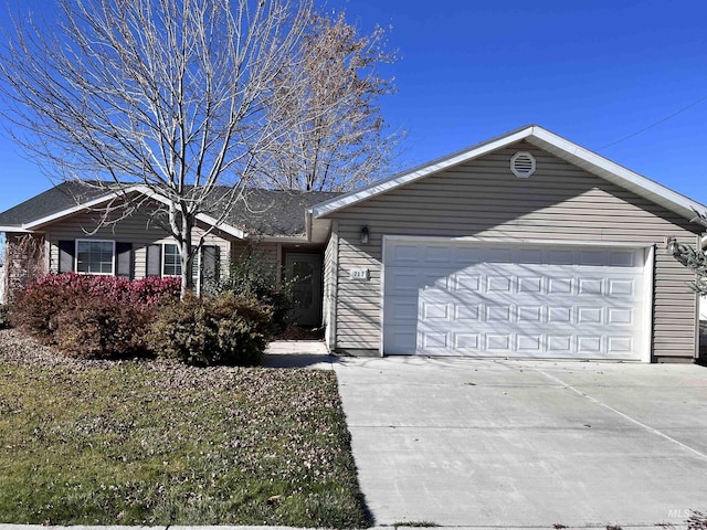 single story home featuring a garage