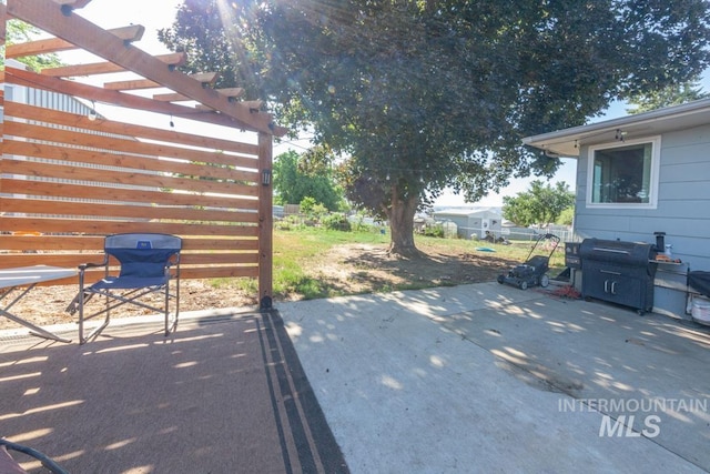 3132 8th St Unit C, Lewiston, ID 83501 - view of patio featuring grilling area and a pergola