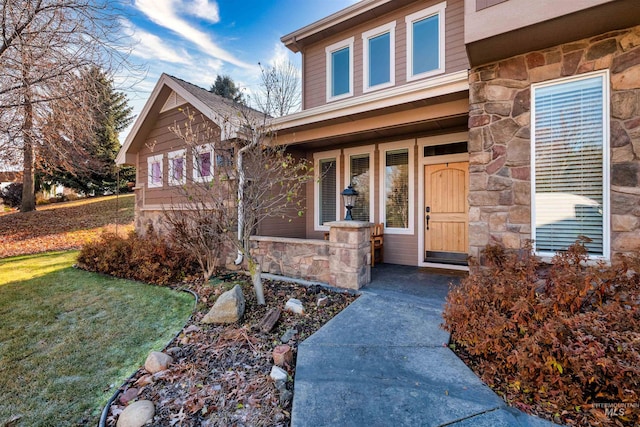 doorway to property with covered porch