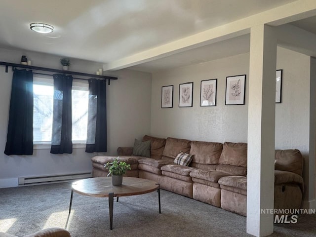 carpeted living room featuring beam ceiling and a baseboard heating unit