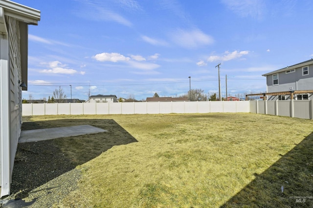 view of yard with fence