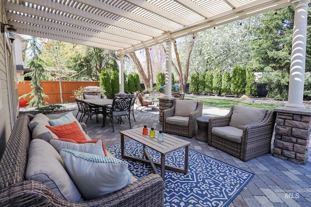 view of patio featuring a fenced backyard, a pergola, outdoor dining space, and outdoor lounge area