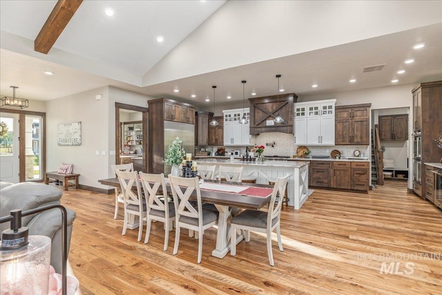 3800 Birch Ln, Emmett, ID 83617 - dining space featuring light wood-style floors, recessed lighting, and high vaulted ceiling