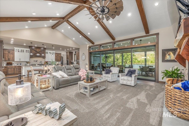3800 Birch Ln, Emmett, ID 83617 - living room featuring high vaulted ceiling, beam ceiling, recessed lighting, and light colored carpet