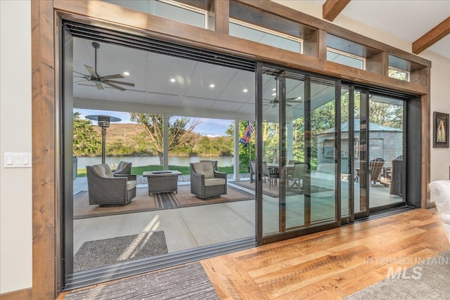 3800 Birch Ln, Emmett, ID 83617 - doorway with a water view, a ceiling fan, healthy amount of natural light, wood finished floors, and beamed ceiling