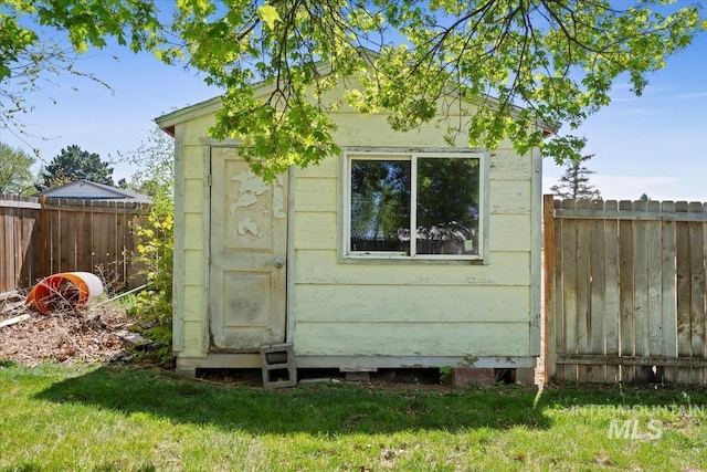 view of outbuilding featuring an outbuilding and a fenced backyard