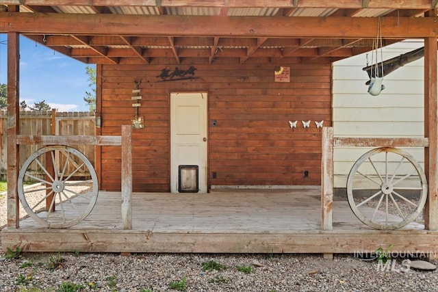 property entrance with fence