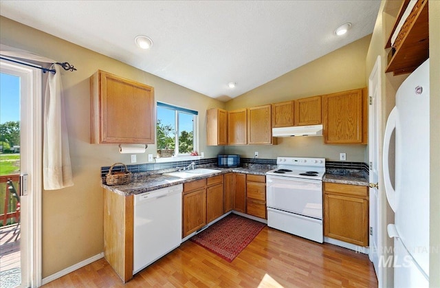 kitchen featuring a sink, white appliances, lofted ceiling, light wood-type flooring, and under cabinet range hood