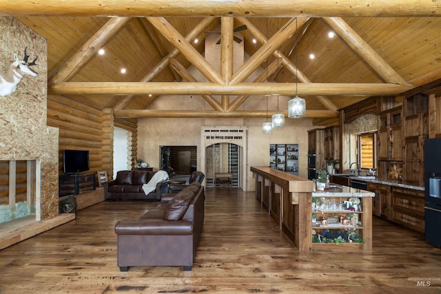 living room featuring beamed ceiling, wooden ceiling, high vaulted ceiling, and dark wood-type flooring