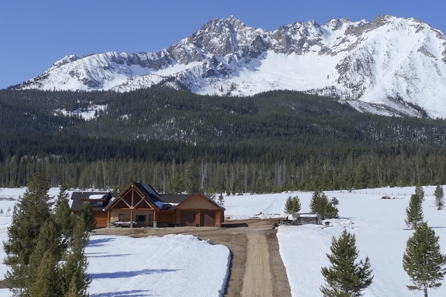 mountain view with a wooded view