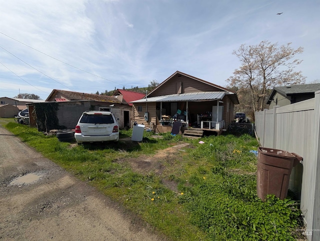 116 Main St, Stites, ID 83552 - view of front of home with fence and a porch