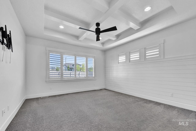 carpeted empty room featuring a ceiling fan, beamed ceiling, recessed lighting, coffered ceiling, and a tray ceiling
