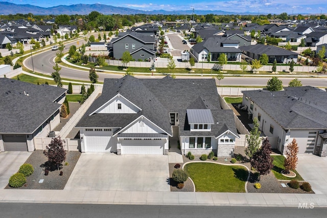 aerial view of residential area with mountains