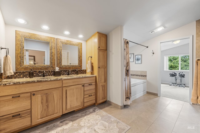 1611 Woodhaven Ln, Mccall, ID 83638 - full bathroom with vanity, baseboards, lofted ceiling, recessed lighting, and tile patterned floors