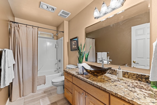 1611 Woodhaven Ln, Mccall, ID 83638 - full bathroom with vanity, shower / bath combo, and toilet