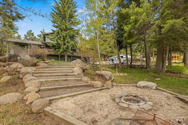 1611 Woodhaven Ln, Mccall, ID 83638 - view of yard with a fire pit and stairway