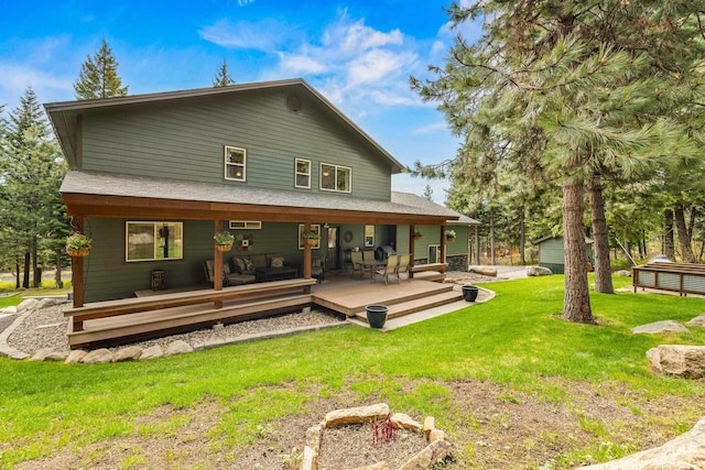 1611 Woodhaven Ln, Mccall, ID 83638 - rear view of house featuring a lawn and a wooden deck