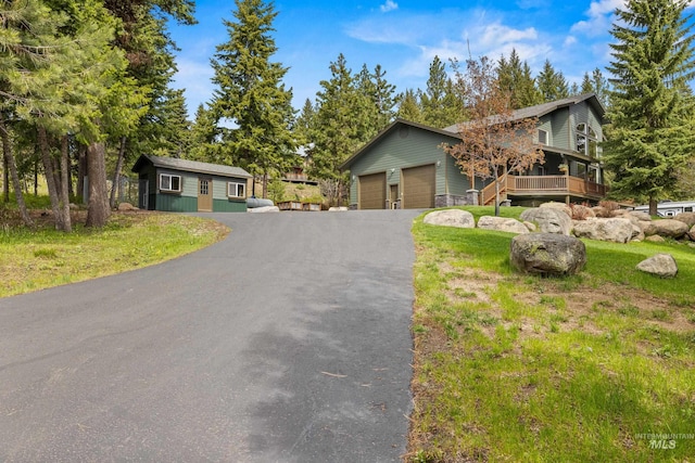 1611 Woodhaven Ln, Mccall, ID 83638 - view of front of house with an outbuilding and driveway