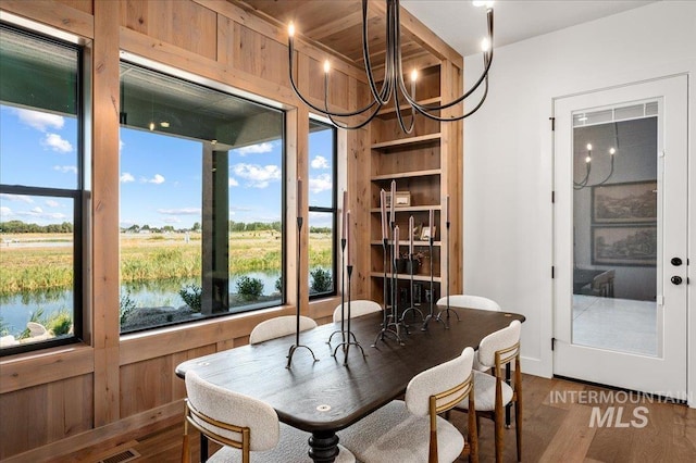 461 Centry Ave, Middleton, ID 83644 - dining space featuring wood finished floors and a chandelier