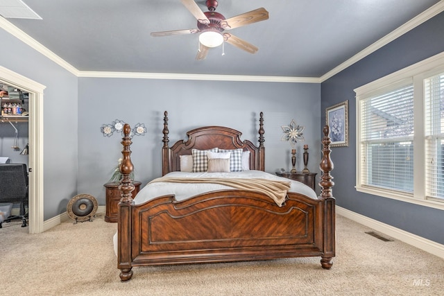 bedroom featuring crown molding, carpet floors, visible vents, and baseboards