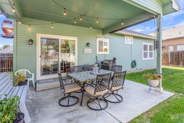 view of patio / terrace with fence and outdoor dining area