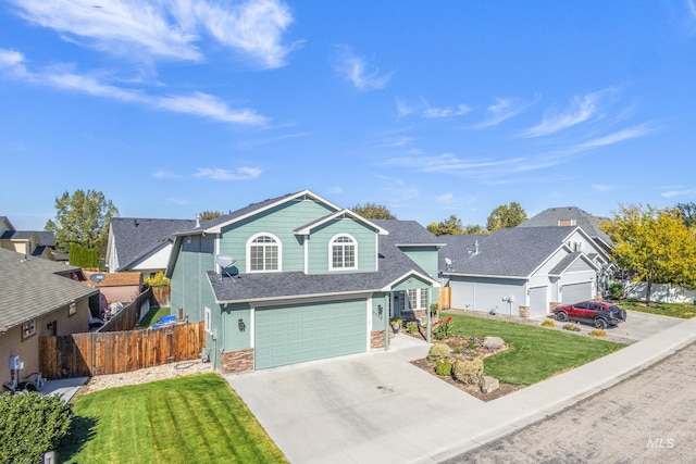 traditional-style home with stone siding, a residential view, an attached garage, fence, and a front lawn