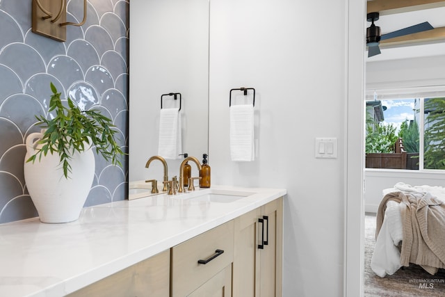bathroom featuring vanity and connected bathroom